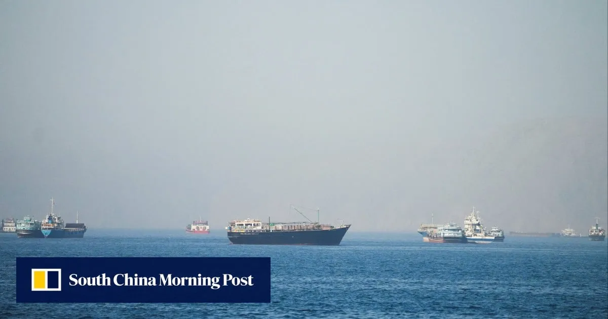 Singapore-flagged cargo ship hit by ‘unknown projectile’ while crossing Hormuz