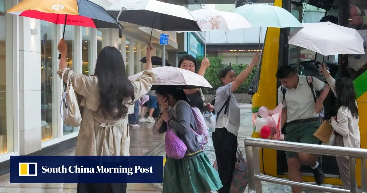 Hong Kong downgrades red rainstorm warning to amber after class suspensions