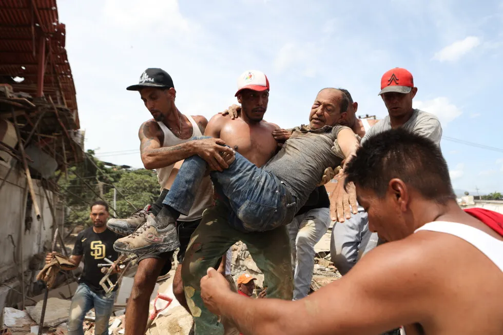 Neighbors dig through Venezuela rubble to search for loved ones after 2 deadly earthquakes