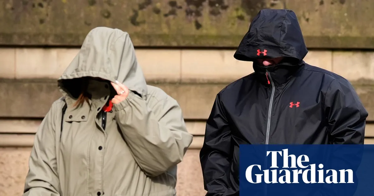 Court lifts anonymity order on 13 men charged alongside man accused of drugging and raping wife