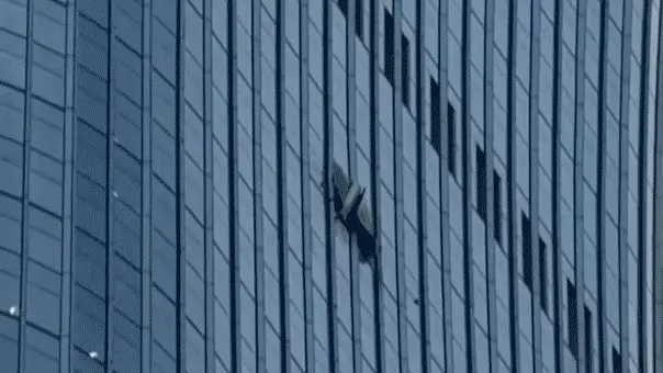 Video shows gaping hole after small plane crashes into towering skyscraper