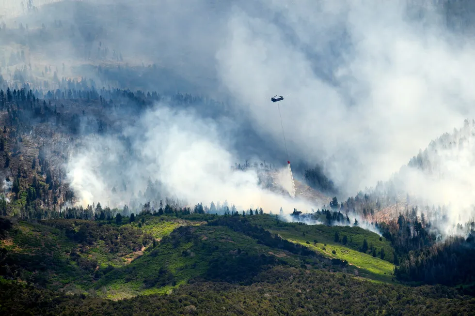 Dry, windy conditions fuel explosive wildfire growth across western US