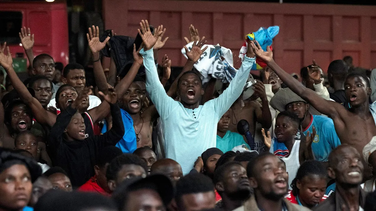 DR Congo fans celebrate reaching World Cup knockout stage