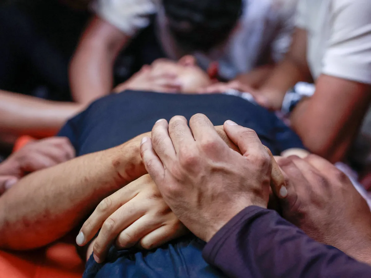 Israeli attacks kill four men and a boy in Gaza and a teenager in West Bank