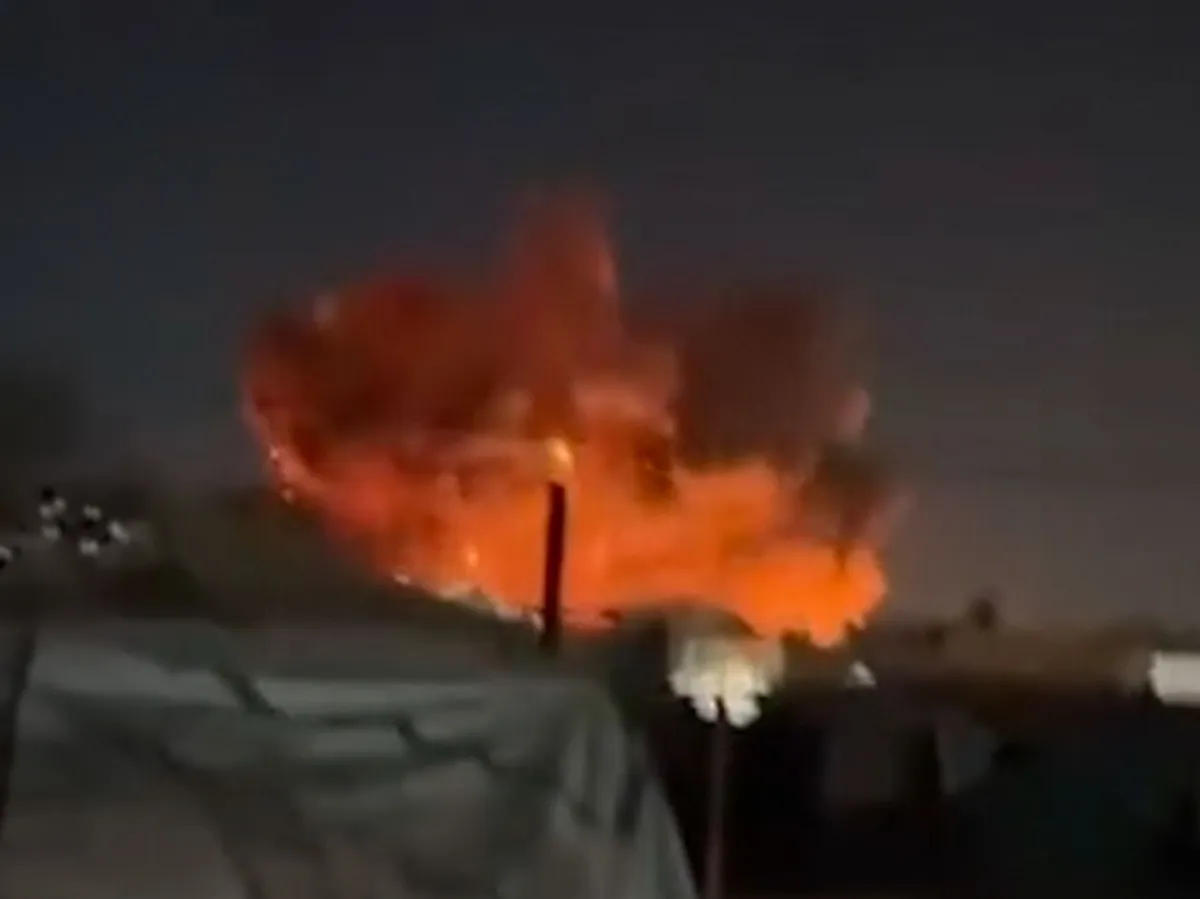 Israeli strike kills two, setting tents ablaze in Gaza humanitarian zone