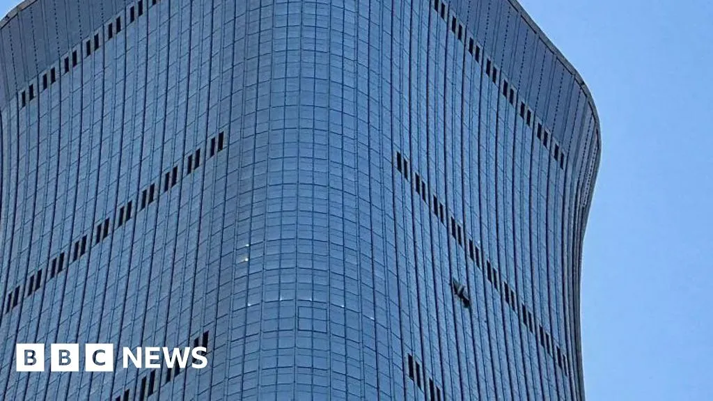 A plane crashed into a tower in Beijing but China is not saying what happened