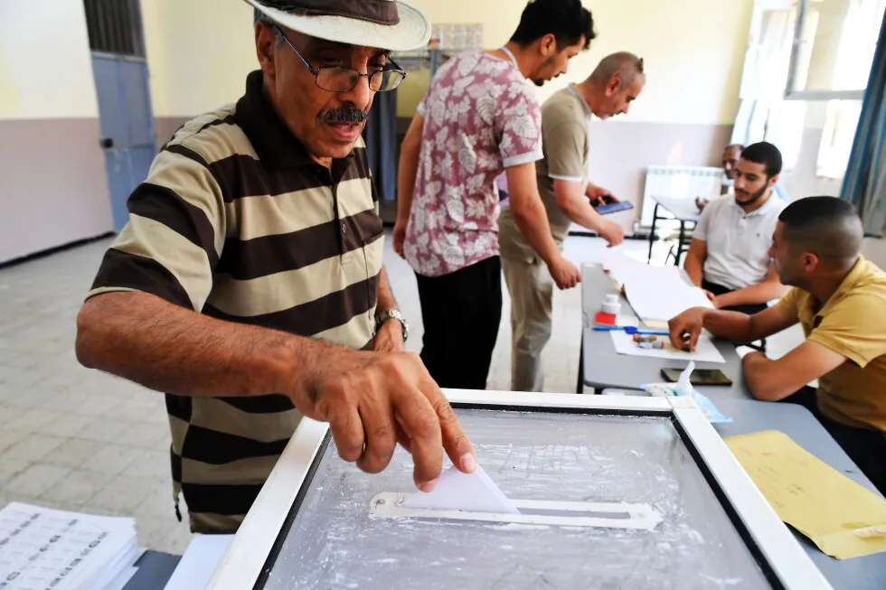 Algerians vote in parliamentary elections while facing cost-of-living strains and candidate bans