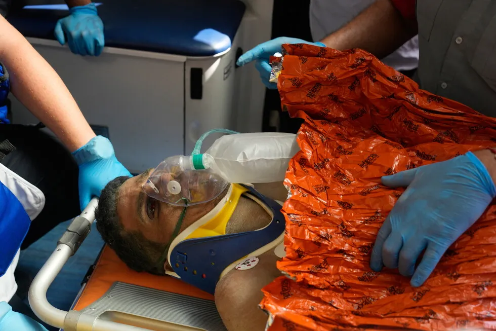 Venezuelan security guard pulled alive from building basement 8 days after twin quakes