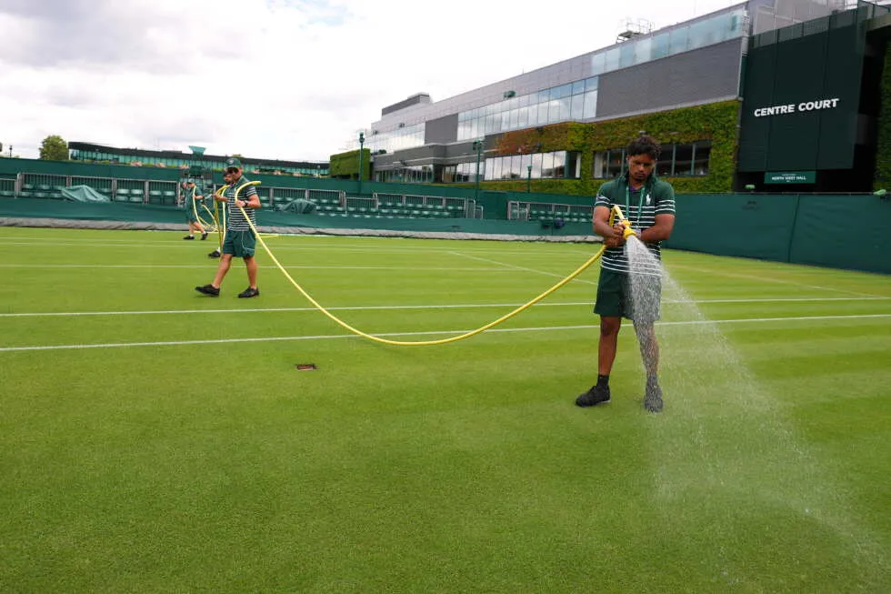 Wimbledon kept its courts lush green as other London lawns browned in record heat