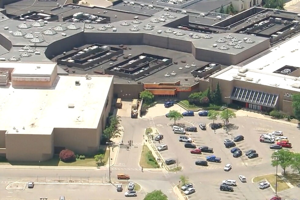 Police investigate a shopping mall shooting in suburban Detroit