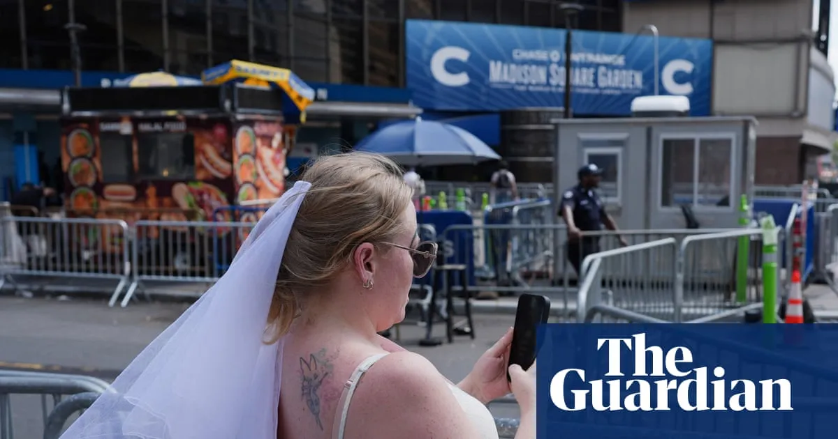 Taylor Swift fans brave the New York heat to be (at least somewhat) near wedding to Travis Kelce