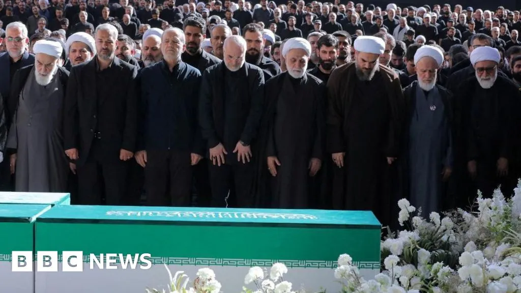 Iran's supreme leader absent as senior officials attend ayatollah's funeral