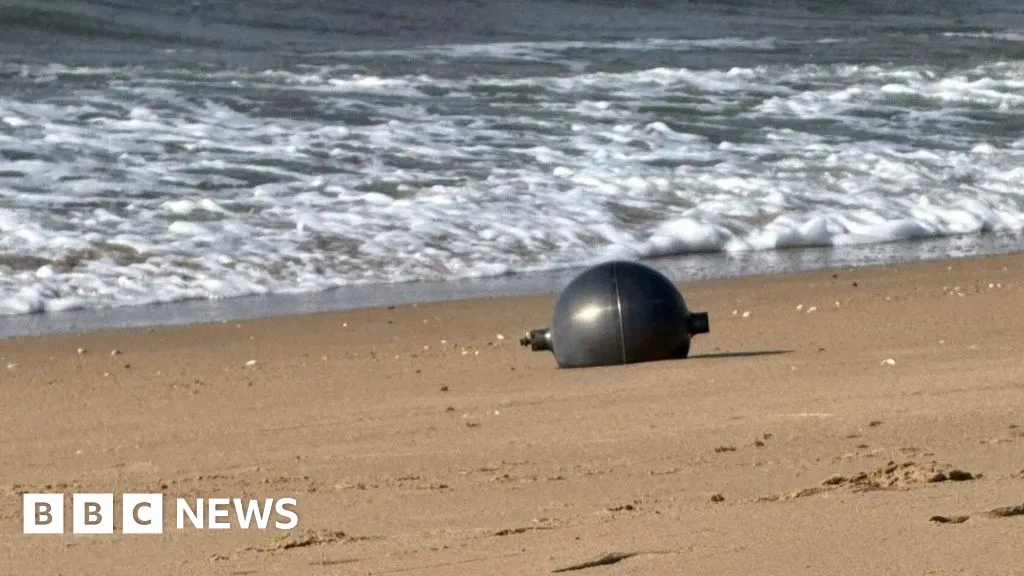 Australia probes mystery space balls that washed up on beach