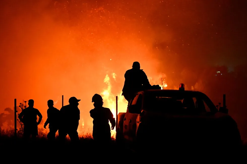 Hundreds of firefighters battle a wildfire in Portugal, while Greek authorities warn of toxic smoke