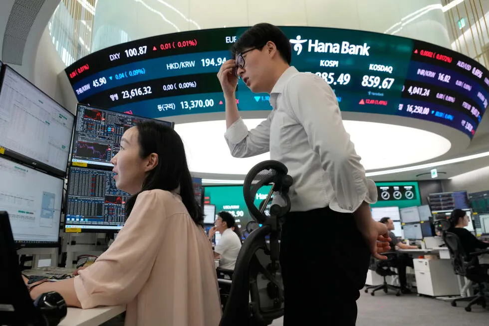 Asian markets retreat after rebounding AI stocks send the S&amp;P 500 to brink of a new record