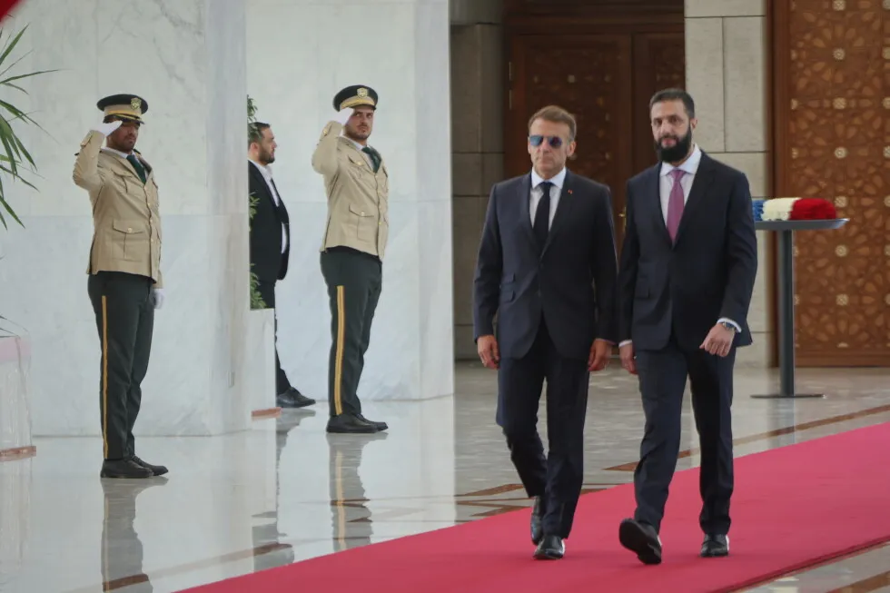 Explosions rock Damascus as French President Macron visits Syria