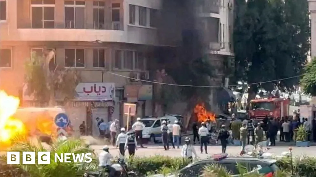 Explosions injure 18 in Damascus during Macron's visit