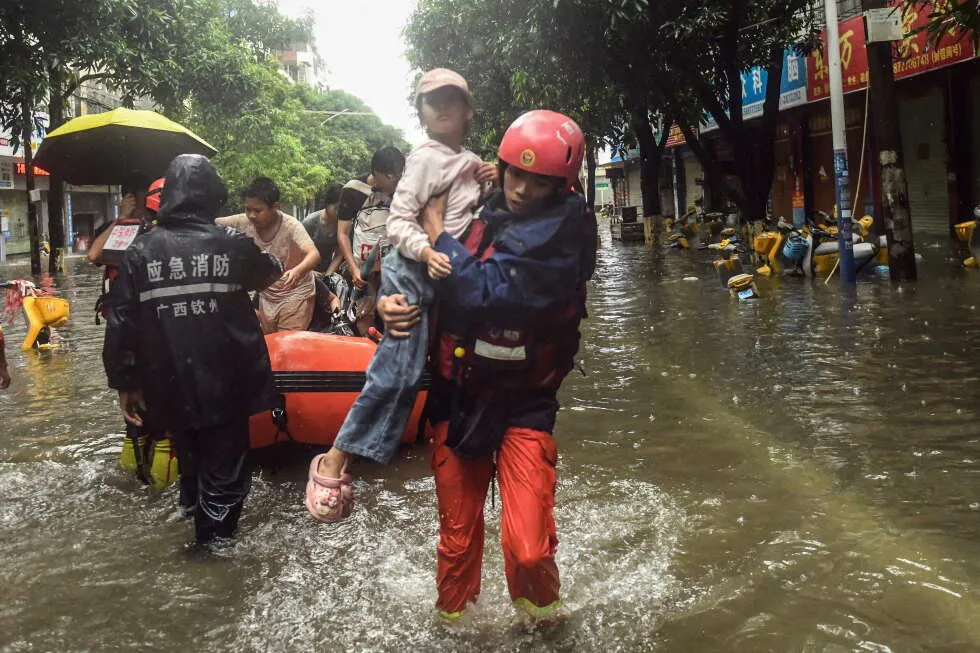 A southern Chinese region reels from floods and destruction from remnants of tropical storm
