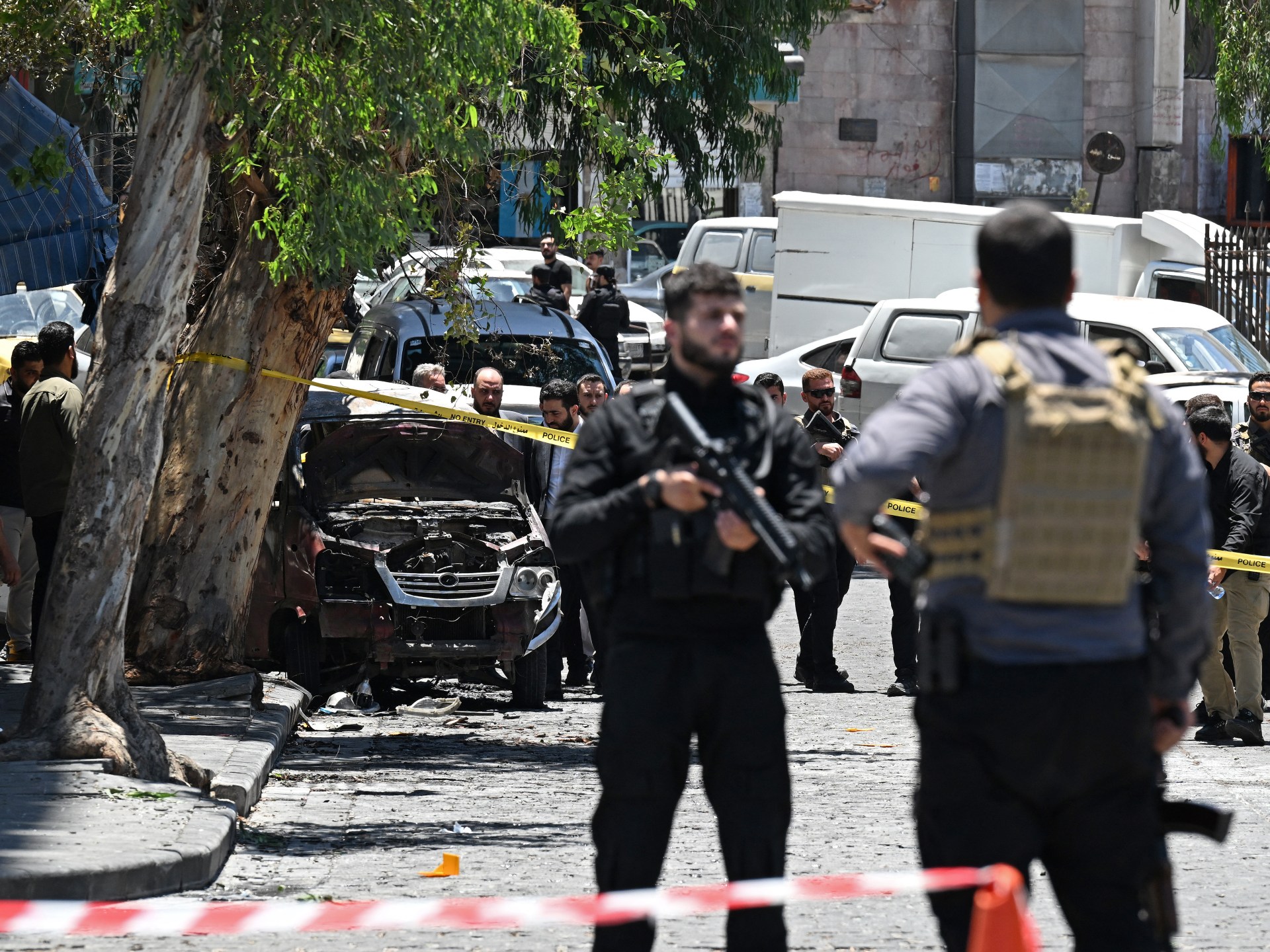 Bomb attacks rattle Damascus but for most Syrians, life goes on