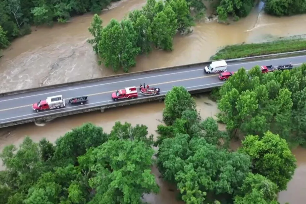 Emergency crews rescue about 20 after a campground building collapses in Missouri flooding