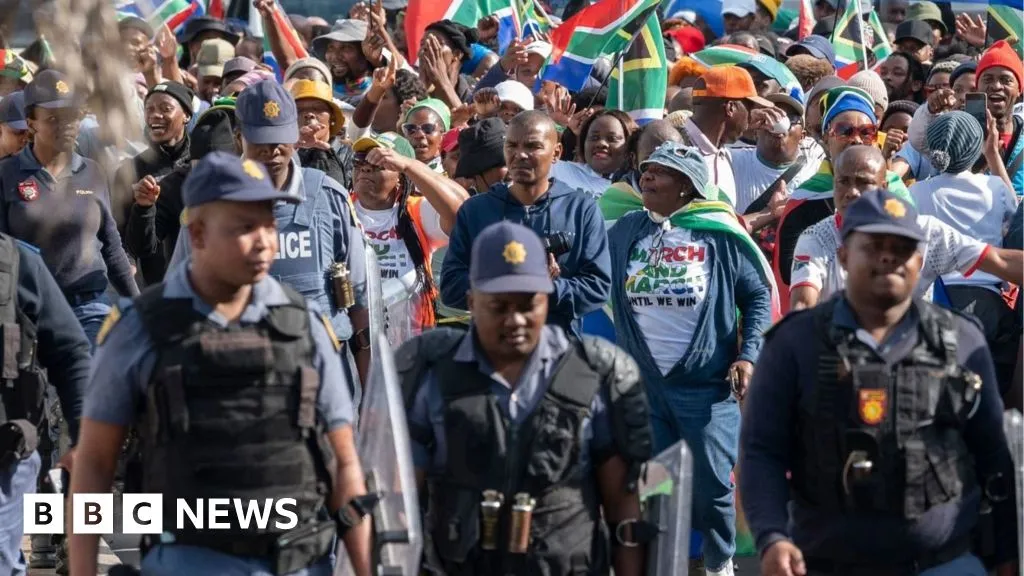Special police team to investigate killing of an anti-migrant leader in South Africa