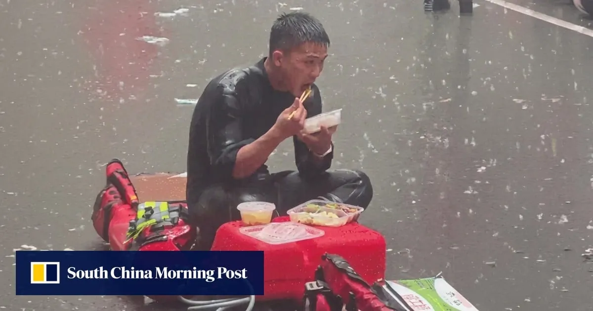 Video capturing Chinese firefighter eating in rain during flood relief goes viral