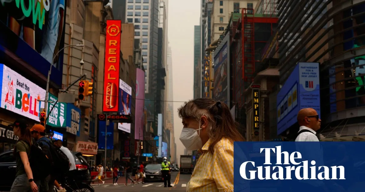 ‘My eyes were stinging’: New Yorkers navigate smoky air and soaring temperatures