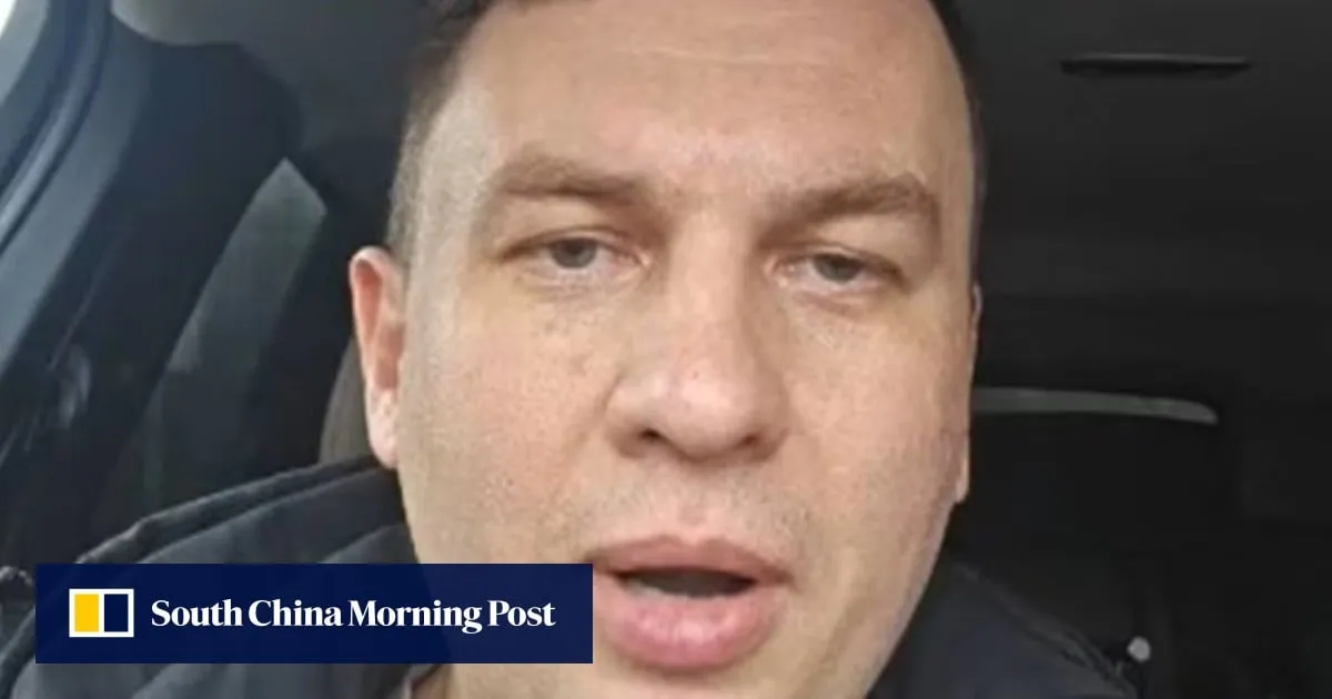 Russian activist arrested a day after predicting Putin will end up in handcuffs