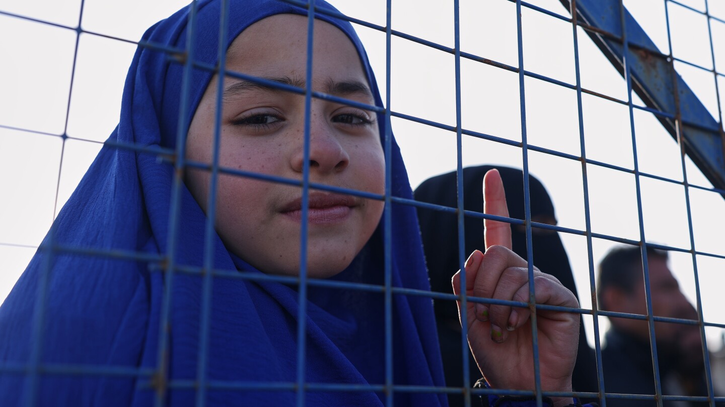 US military transfers the first 150 Islamic State group detainees from Syria to Iraq