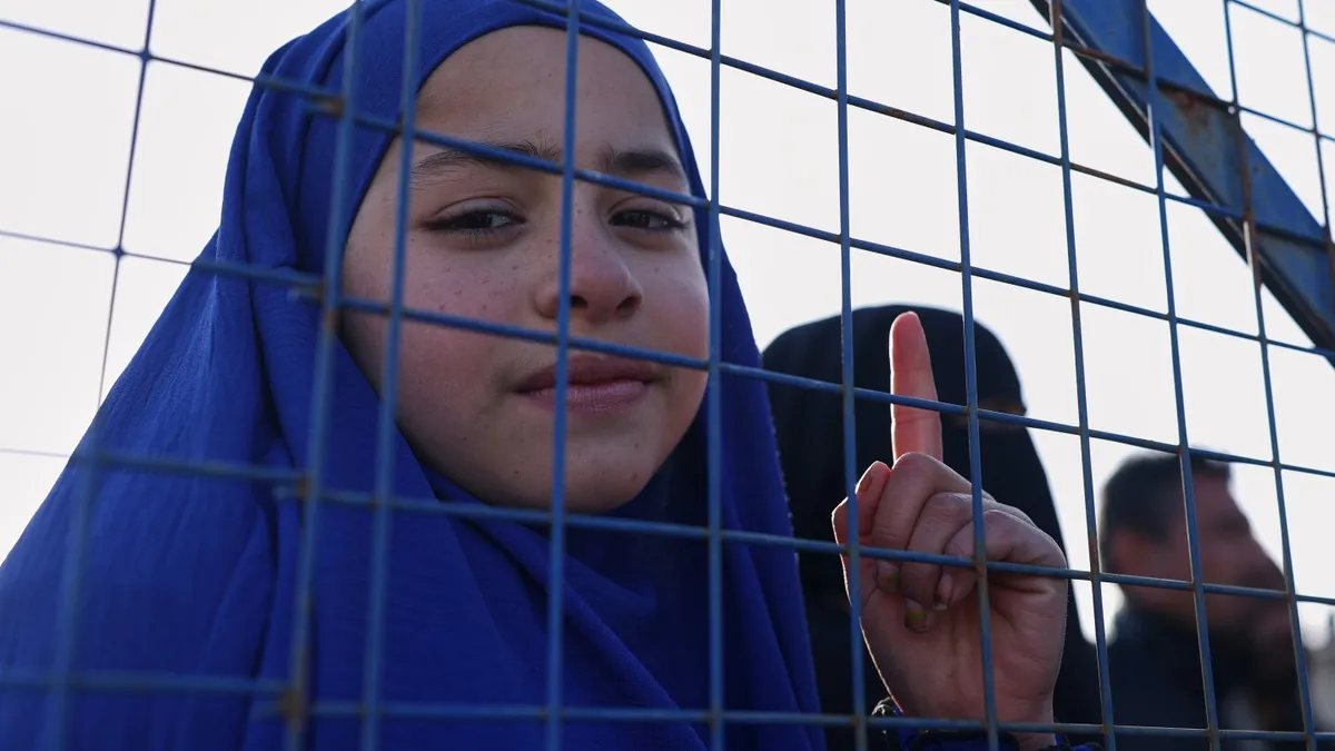 US military transfers the first 150 Islamic State group detainees from Syria to Iraq