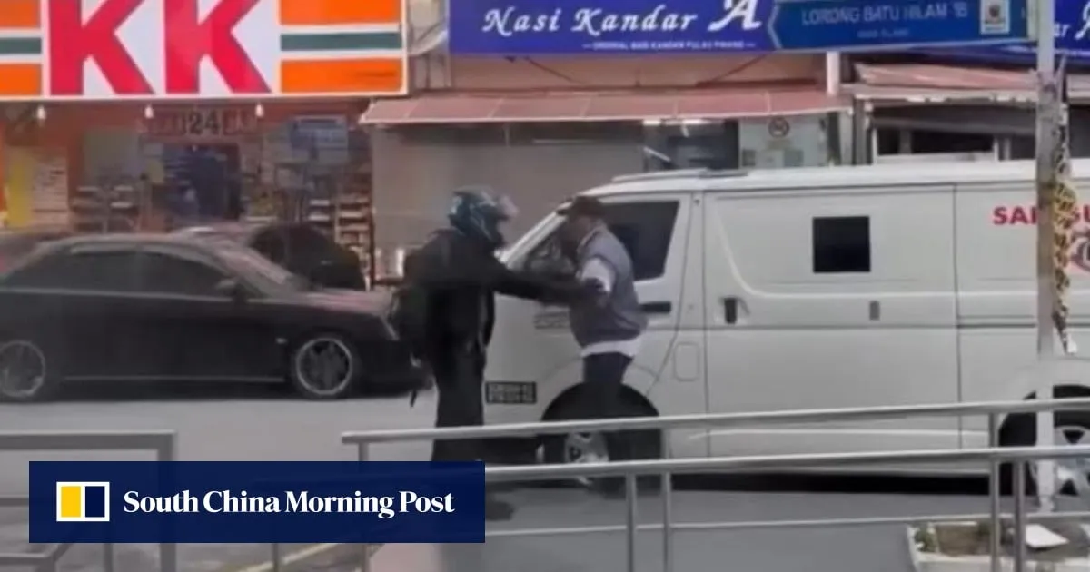 In Malaysia, robber flees empty-handed after guard locks US$20,000 inside armoured van