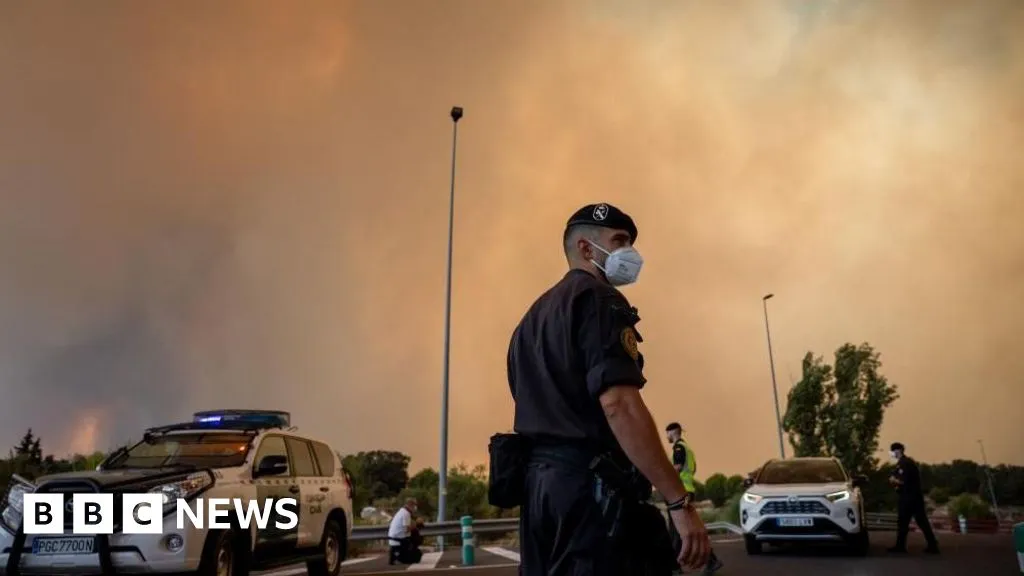 Firefighters struggle to contain Madrid wildfires, as more than 140,000 evacuated in France and Spain
