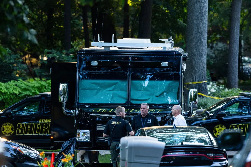 Authorities say man killed his family, then himself, before all were found in Michigan home fire