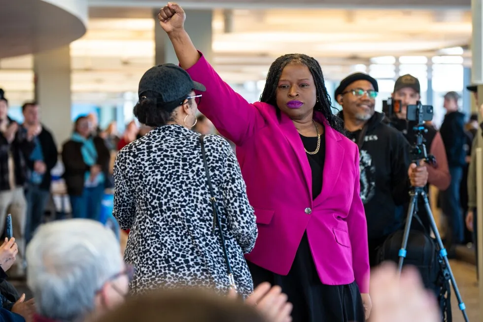 A woman who led a protest that disrupted a Minnesota church service has been arrested