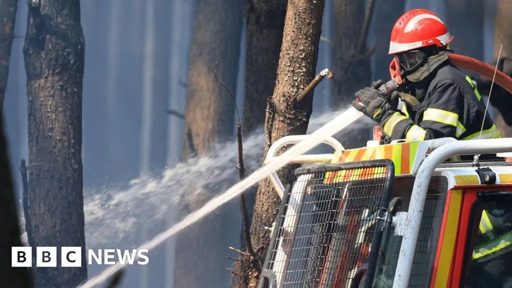 France fire crews face searing heat in battle to contain flames