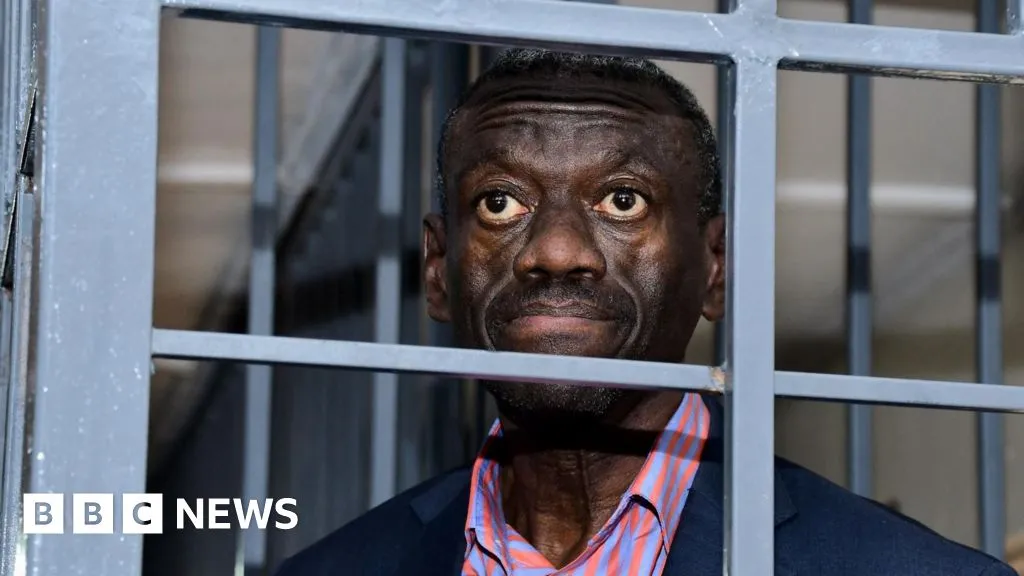 Veteran Ugandan opposition politician collapses in court and in ICU, his wife says