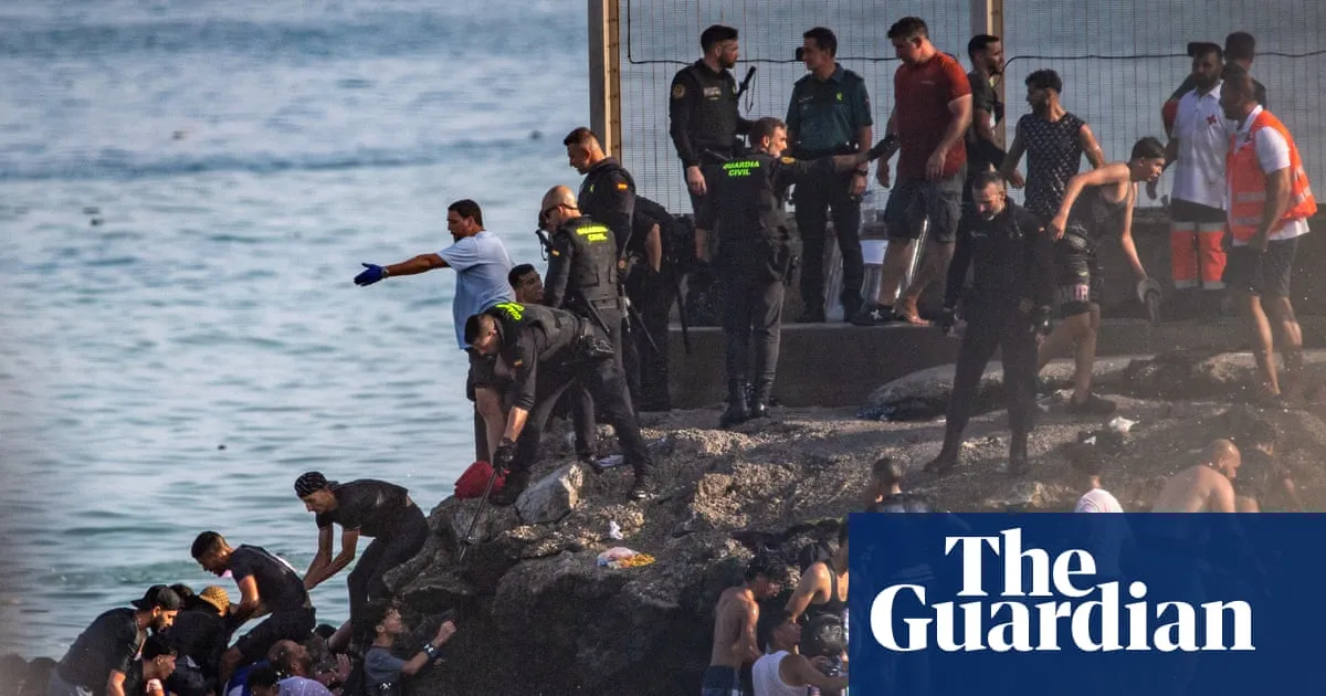 At least 18 die as 49,000 people cross to Spanish enclave of Ceuta from Morocco