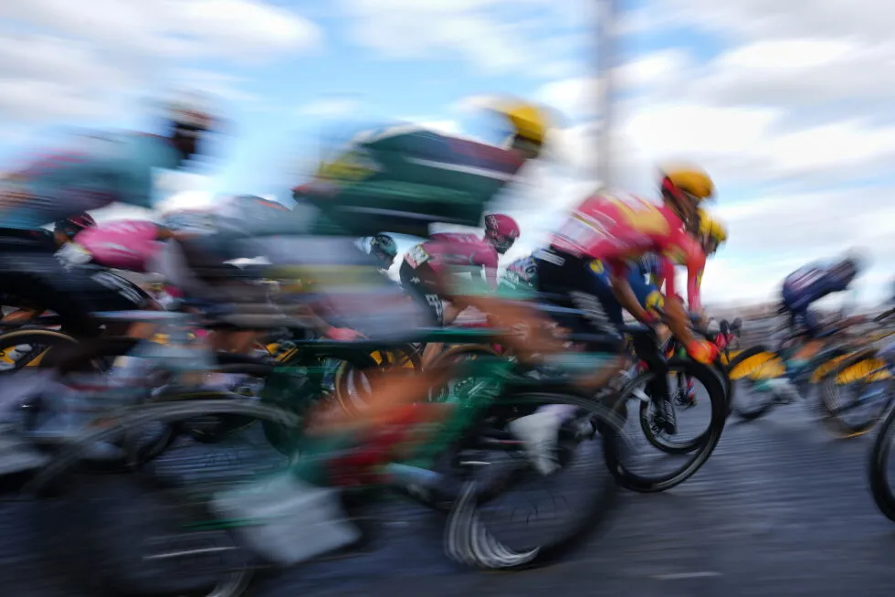 A slow shutter captures the Tour de France at full speed