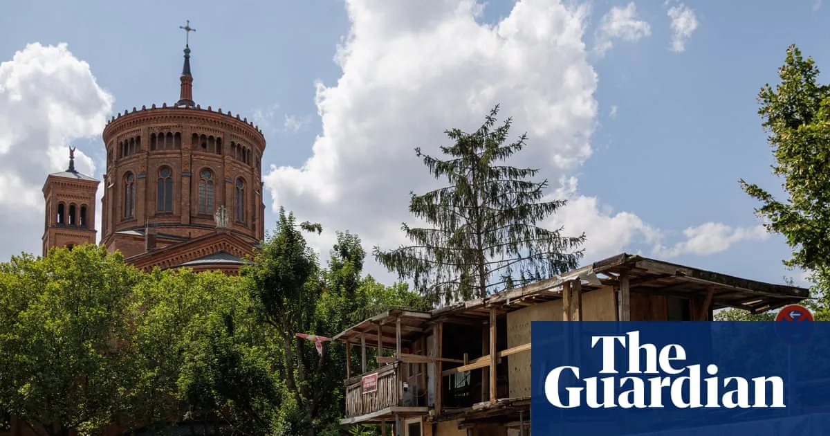 ‘A symbol of resistance’: the fight to save treehouse built on no man’s land next to Berlin Wall