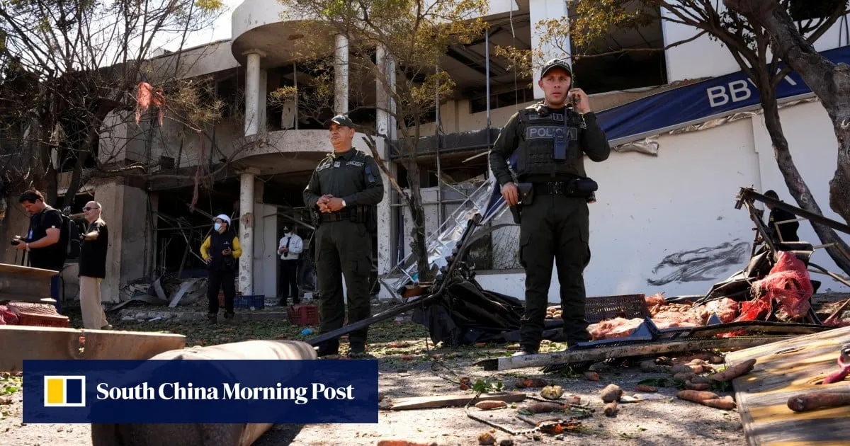 Truck explodes outside Colombia police base, injuring 11 officers and killing a dog