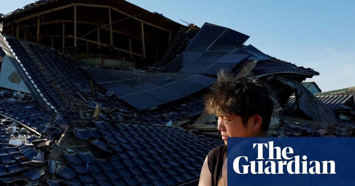 Japan’s prime minister tours quake-hit sites as recovery efforts hampered by soaring temperatures