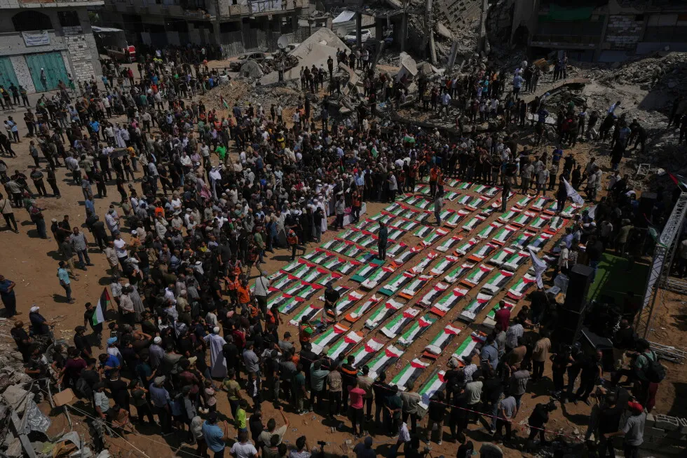 Palestinians hold mass funeral for 112 bodies finally recovered from a 2023 Gaza strike