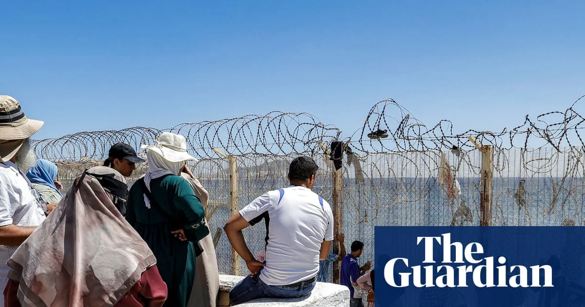 Hundreds in Morocco gather near Ceuta border in anxious wait for missing loved ones