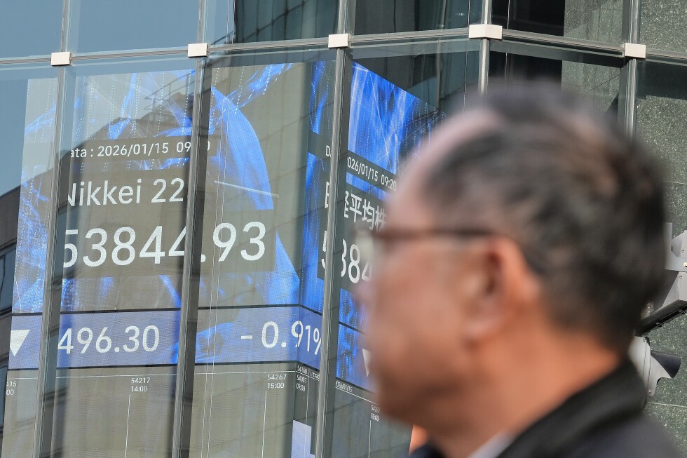 US futures slip and world shares are mixed as Japan keeps its key interest rate unchanged