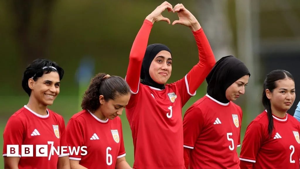 Banned from football at home, Afghan women's team reunite 8,000 miles away