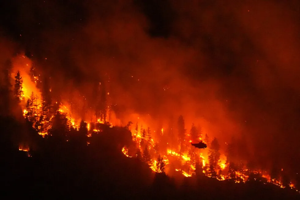 Climate change contributed to big Canada fires, study says as Trump blames mismanagement